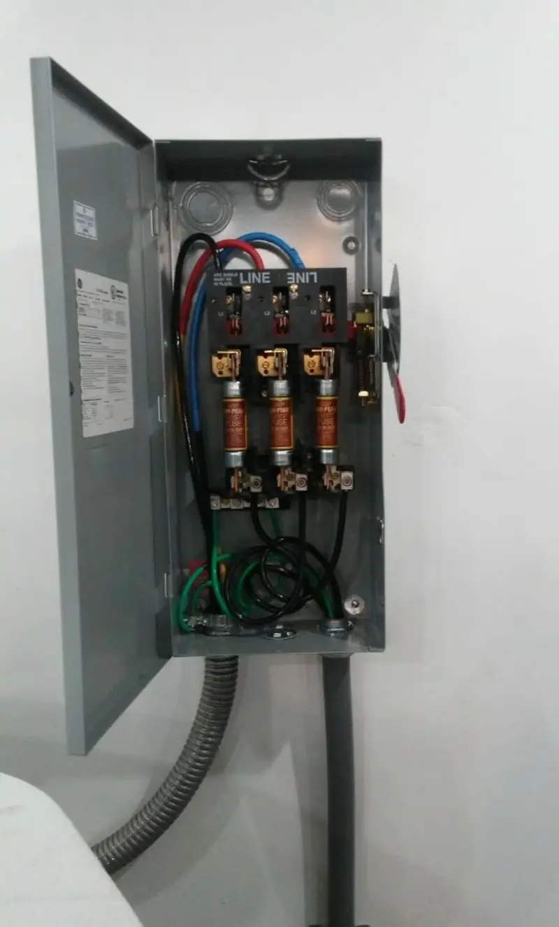 Three-phase disconnect switch installed for Smoke Detector Installation in Dumont